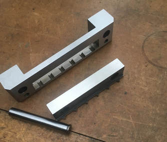 Components manufactured on a CNC machine.